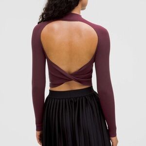 Lululemon Ribbed-Knit Twist-Back Mockneck Sweater
Garnet